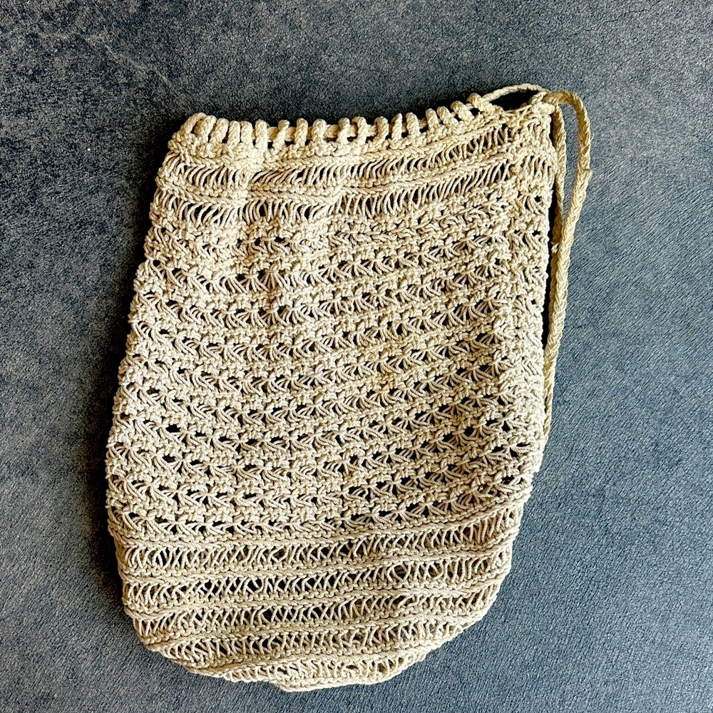 DKNY crochet backpack or knapsack. Natural light straw color